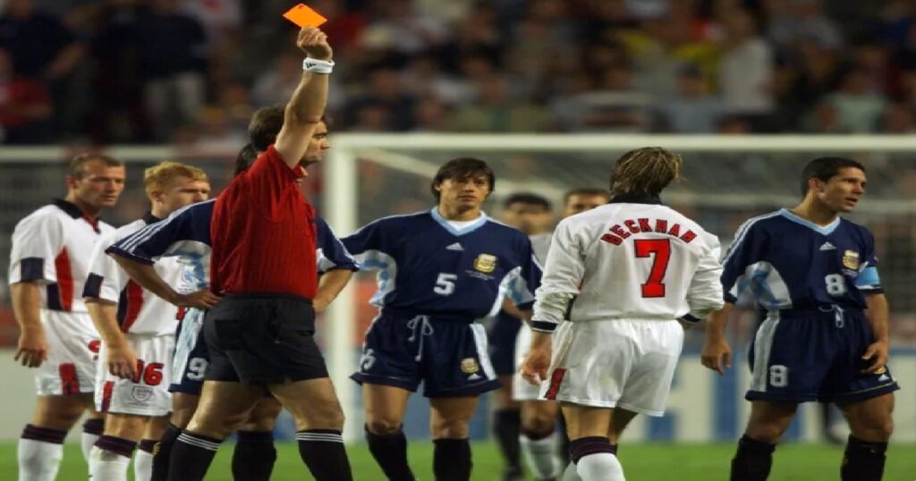 Danish referee Kim Milton Nielsen sends off Englands David Beckham against Argentina at France 1998